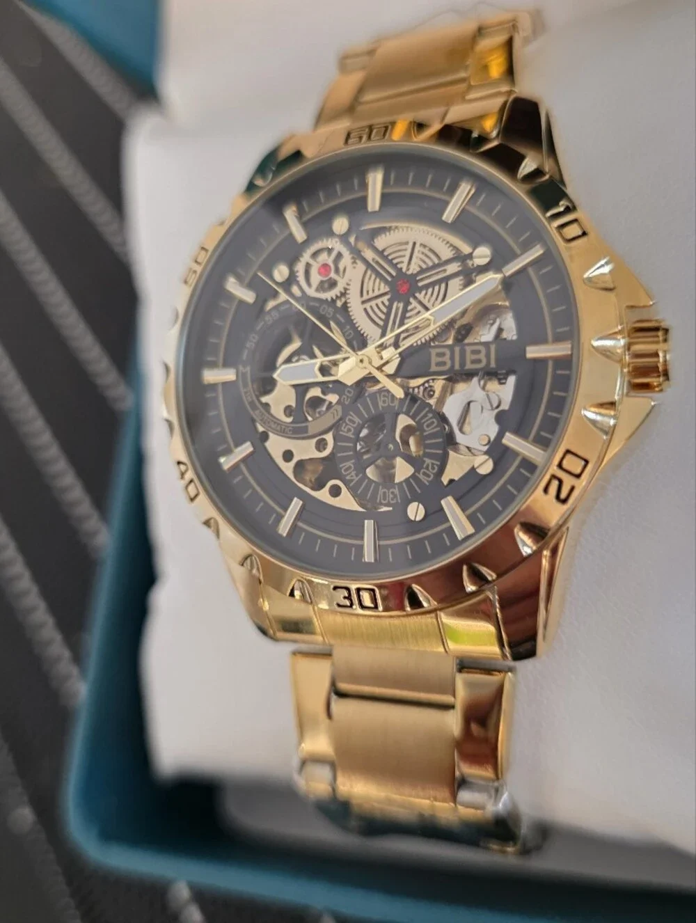 BiBi Gold Tone Skeleton Dial Watch with Black Accents